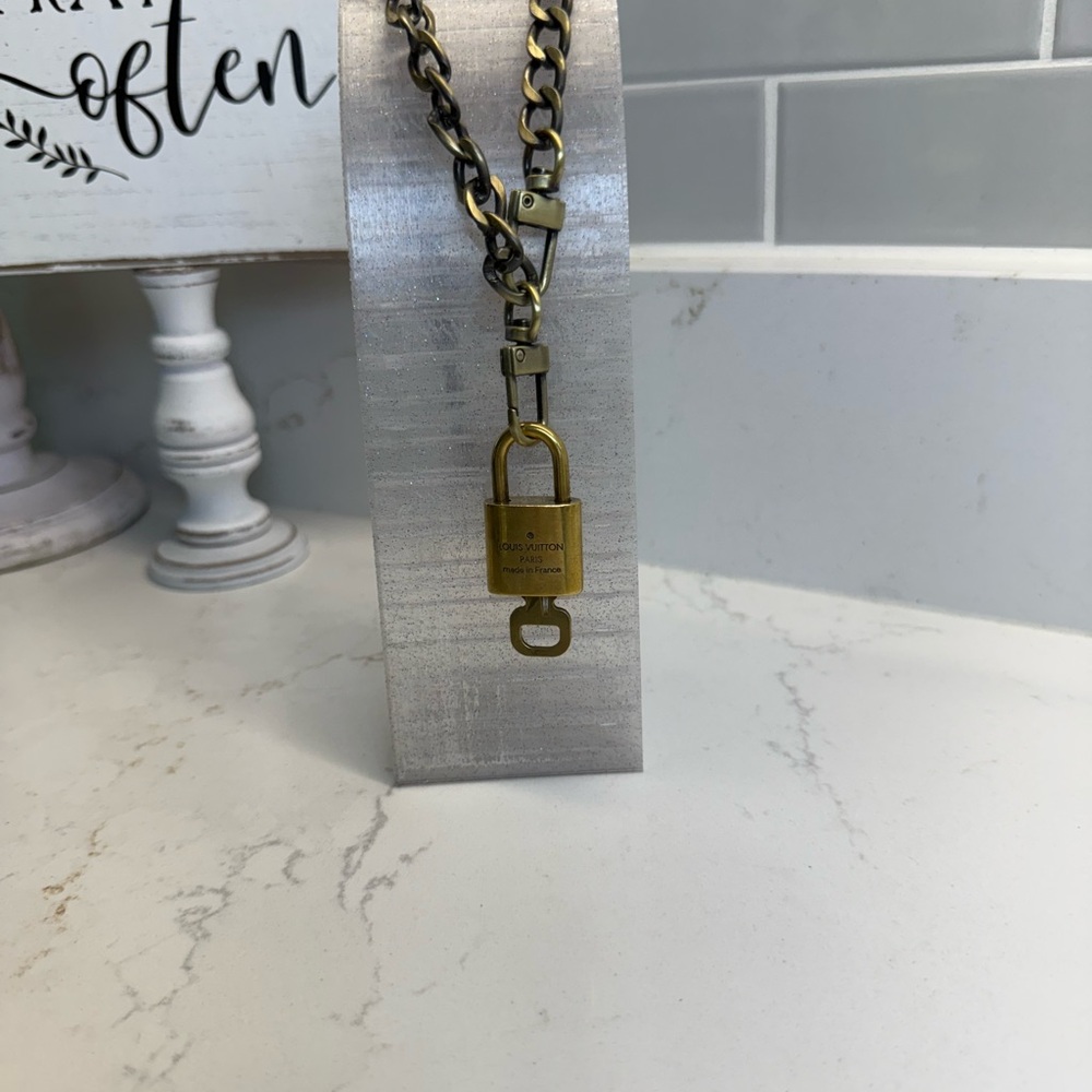 Louis Vuitton Lock & Key on bronze chain